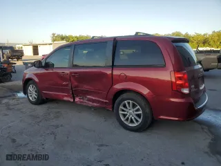 2016 Dodge Grand Caravan SXT with VIN 2C4RDGCG3GR194892, listed as a Copart auction lot 52001855 with 148,569 mi miles and Salvage Title. Bid and sale history available at carsss.com. Image 2.