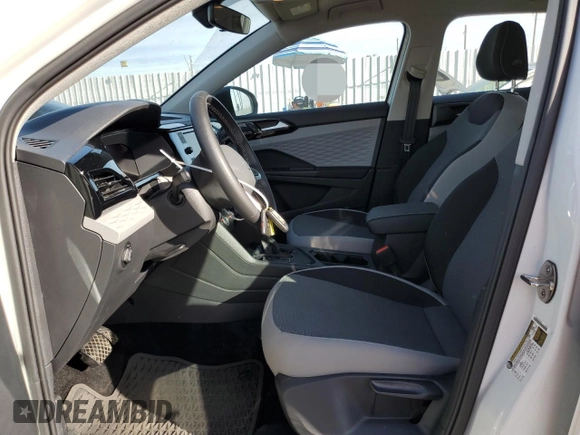 2023 Volkswagen Taos S с VIN 3VVCX7B25PM370076, выставлен на аукционе Copart как лот 47201035 с пробегом 12 000 миль миль и Списание • Salvage title. История ставок и продаж доступна на DreamBid. Изображение 7.