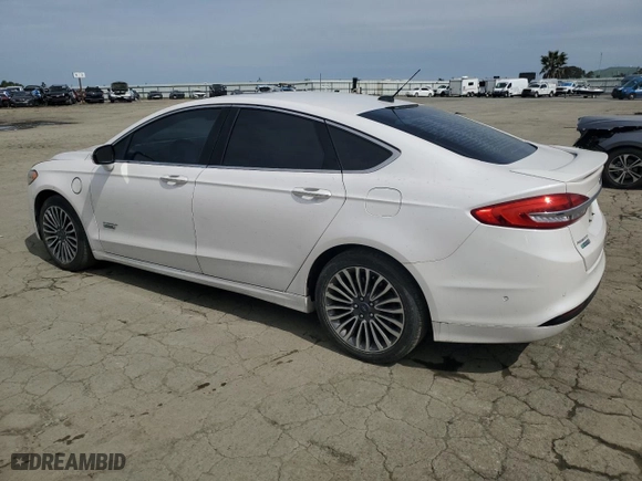 2017 Ford Fusion Energi Titanium with VIN 3FA6P0SUXHR313533, listed as a Copart auction lot 49813215 with 100,698 mi miles and Salvage Title. Bid and sale history available at carsss.com. Image 2.
