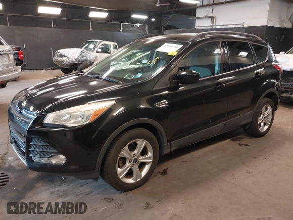 2014 Ford Escape SE with VIN 1FMCU0GX6EUE31877, listed as a IAAI auction lot 42080730 with 71,251 mi miles. Bid and sale history available at carsss.com. Image 18.