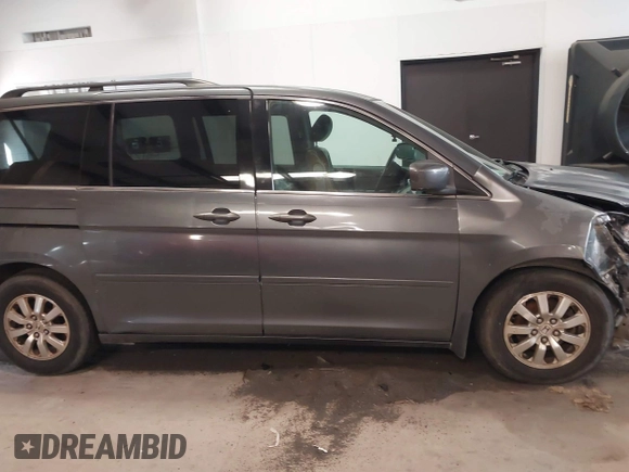 2010 Honda Odyssey EX-L with VIN 5FNRL3H7XAB080170, listed as a IAAI auction lot 41241879 with 221,272 mi miles. Bid and sale history available at carsss.com. Image 13.