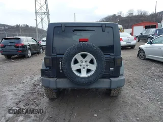 2011 Jeep Wrangler Unlimited Sport with VIN 1J4BA3H17BL552319, listed as a IAAI auction lot 41747031 with 120,751 mi miles. Bid and sale history available at carsss.com. Image 17.