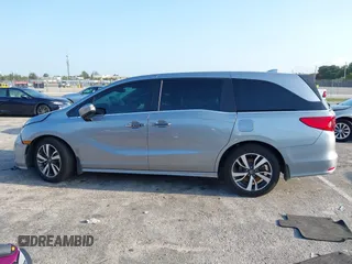 2023 Honda Odyssey Touring with VIN 5FNRL6H86PB020700, listed as a IAAI auction lot 41961098 with 66,512 mi miles and . Bid and sale history available at DreamBid. Image 14.