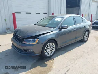 2015 Volkswagen Jetta SE with VIN 3VWD07AJ2FM310154, listed as a IAAI auction lot 42456136 with 96,979 mi miles and . Bid and sale history available at DreamBid. Image 2.