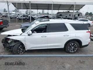 2021 Hyundai Palisade SEL z VIN KM8R24HE3MU305527, wystawiony jako IAAI lot #41890500 z przebiegiem 55 514 mil mil oraz . Historia ofert i sprzedaży dostępna na DreamBid. Obrazek 14.