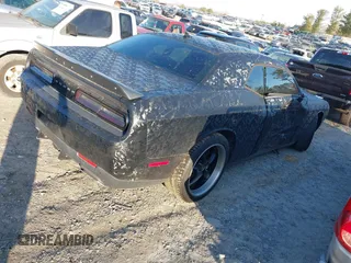 2016 Dodge Challenger R/T Scat Pack z VIN 2C3CDZFJ5GH177997, wystawiony jako IAAI lot #41470614 z przebiegiem 52 728 mil mil oraz . Historia ofert i sprzedaży dostępna na DreamBid. Obrazek 4.
