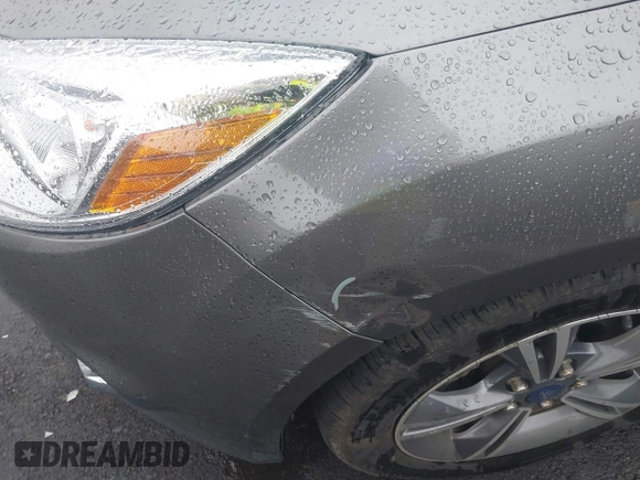 2014 Ford Focus SE with VIN 1FADP3K21EL462169, listed as a IAAI auction lot 42145524 with 100,156 mi miles. Bid and sale history available at carsss.com. Image 6.