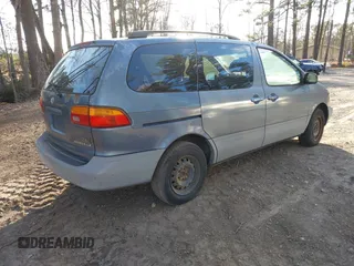 2000 Toyota Sienna LE with VIN 4T3ZF13C5YU181671, listed as a IAAI auction lot 41733892 with 212,013 mi miles. Bid and sale history available at carsss.com. Image 4.