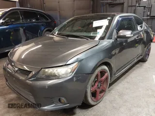 2012 Scion tC with VIN JTKJF5C7XC3034998, listed as a IAAI auction lot 41591632 with 171,121 mi miles. Bid and sale history available at carsss.com. Image 2.