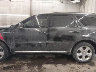 2014 Dodge Durango Limited with VIN 1C4RDJDG5EC977844, listed as a IAAI auction lot 41558932 with 133,703 mi miles. Bid and sale history available at carsss.com. Image 13.