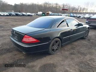 2005 Mercedes-Benz CL-Class 5.0L with VIN WDBPJ75J65A046793, listed as a IAAI auction lot 41187953 with 128,627 mi miles. Bid and sale history available at carsss.com. Image 4.