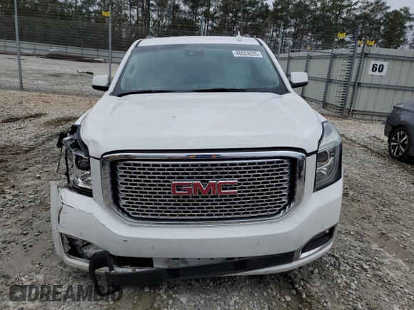 2015 GMC Yukon Denali with VIN 1GKS1CKJ1FR526594, listed as a Copart auction lot 46524205 with 99,095 mi miles and Salvage Title. Bid and sale history available at carsss.com. Image 5.