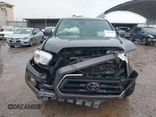 2022 Toyota Tacoma SR5 with VIN 3TMAZ5CN9NM195132, listed as a IAAI auction lot 42383482 with 51,011 mi miles and . Bid and sale history available at DreamBid. Image 13.