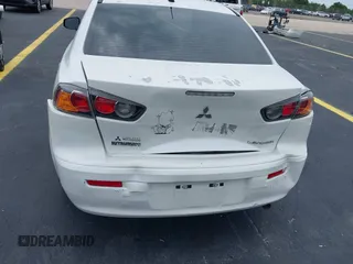 2016 Mitsubishi Lancer ES z VIN JA32U2FU7GU000923, wystawiony jako IAAI lot #42238951 z przebiegiem 134 955 mil mil oraz . Historia ofert i sprzedaży dostępna na DreamBid. Obrazek 6.