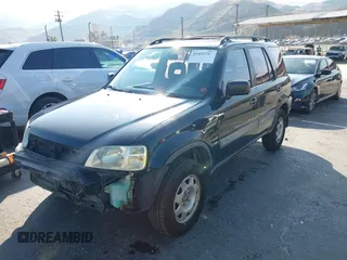 1999 Honda CR-V LX with VIN JHLRD284XXC018161, listed as a IAAI auction lot 41421514 with 209,066 mi miles. Bid and sale history available at carsss.com. Image 2.