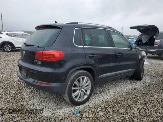 2015 Volkswagen Tiguan SE z VIN WVGBV7AXXFW606017, wystawiony jako Copart lot #51005745 z przebiegiem Nie podano mil oraz Szkoda całkowita • Salvage title. Historia ofert i sprzedaży dostępna na DreamBid. Obrazek 3.