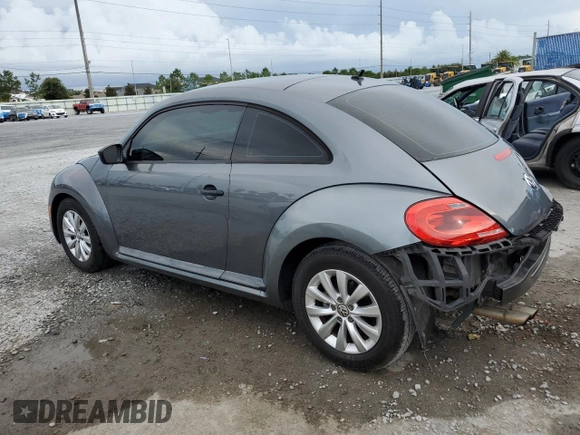 2014 Volkswagen Beetle Entry z VIN 3VWF17AT2EM642942, wystawiony jako Copart lot #60241445 z przebiegiem 70 780 mil mil oraz Szkoda całkowita • Salvage title. Historia ofert i sprzedaży dostępna na DreamBid. Obrazek 2.