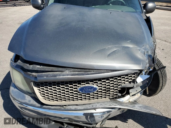 2003 Ford F-150 XL with VIN 1FTRX17W73NA44233, listed as a Copart auction lot 49673205 with Not provided miles and Salvage title. Bid and sale history available at DreamBid. Image 12.