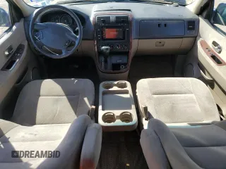 2003 Kia Sedona LX with VIN KNDUP131736409797, listed as a Copart auction lot 46902855 with 142,091 mi miles and Salvage Title. Bid and sale history available at carsss.com. Image 8.