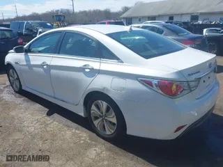 2013 Hyundai Sonata Hybrid Limited with VIN KMHEC4A48DA098289, listed as a IAAI auction lot 41859280 with 72,976 mi miles. Bid and sale history available at carsss.com. Image 3.