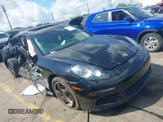 2015 Porsche Panamera 4 z VIN WP0AA2A73FL000297, wystawiony jako IAAI lot #42011075 z przebiegiem Nie podano mil oraz . Historia ofert i sprzedaży dostępna na DreamBid. Obrazek 1.