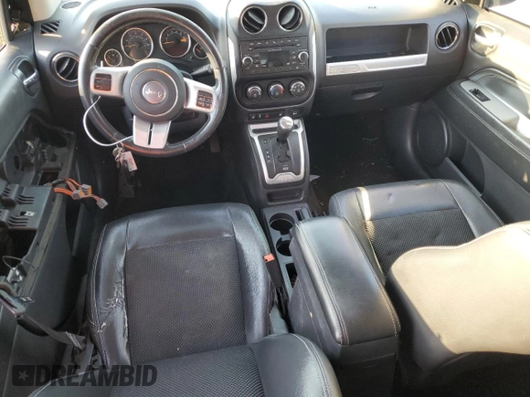 2015 Jeep Compass Latitude with VIN 1C4NJCEBXFD131484, listed as a Copart auction lot 74731464 with 76,048 mi miles and Salvage Title. Bid and sale history available at carsss.com. Image 8.