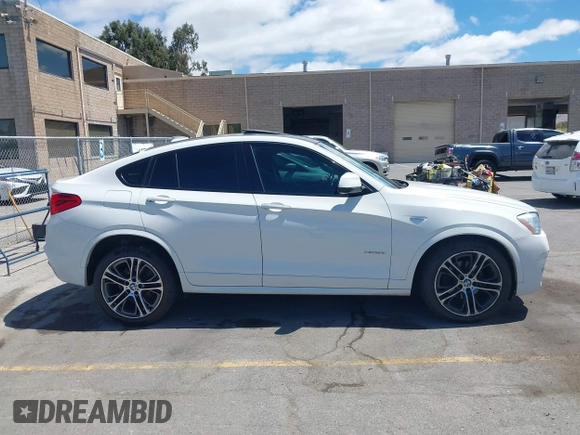 2015 BMW X4 xDrive28i with VIN 5UXXW3C5XF0M89147, listed as a IAAI auction lot 42779290 with 120,773 mi miles and . Bid and sale history available at DreamBid. Image 12.