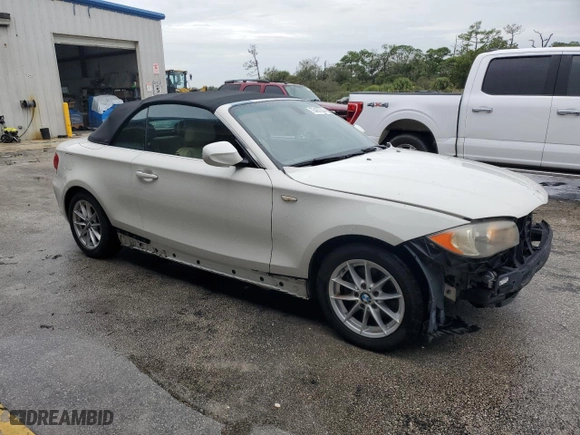 2011 BMW 1 Series 128i with VIN WBAUN1C5XBVH82605, listed as a Copart auction lot 73457334 with 94,969 mi miles and Salvage Title. Bid and sale history available at carsss.com. Image 4.