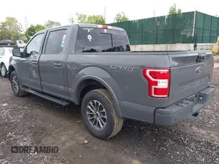 2018 Ford F-150 XL with VIN 1FTEW1EPXJFC85210, listed as a IAAI auction lot 42150759 with 97,660 mi miles and . Bid and sale history available at carsss.com. Image 3.