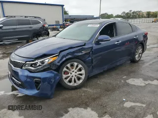 2018 Kia Optima SX with VIN 5XXGW4L24JG247796, listed as a Copart auction lot 51055825 with 106,915 mi miles and Salvage title. Bid and sale history available at DreamBid. Image 1.
