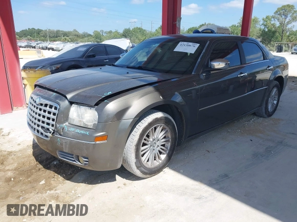 2010 Chrysler 300 Touring with VIN 2C3CA5CV5AH233033, listed as a IAAI auction lot 42130676 with 158,323 mi miles and . Bid and sale history available at DreamBid. Image 2.