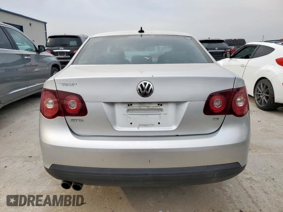 2008 Volkswagen Jetta SE z VIN 3VWRM71K98M063043, wystawiony jako Copart lot #50171755 z przebiegiem 151 740 mil mil oraz Szkoda całkowita • Salvage title. Historia ofert i sprzedaży dostępna na DreamBid. Obrazek 6.