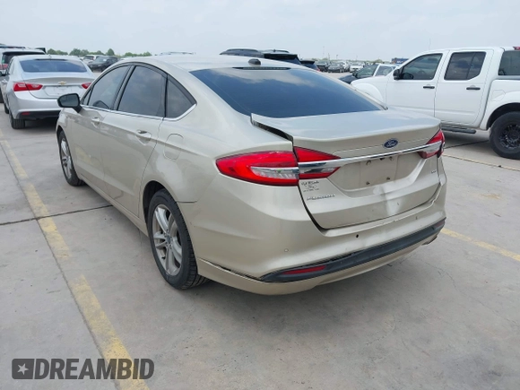 2018 Ford Fusion SE z VIN 3FA6P0H75JR176394, wystawiony jako IAAI lot #42169780 z przebiegiem 65 617 mil mil oraz . Historia ofert i sprzedaży dostępna na DreamBid. Obrazek 3.