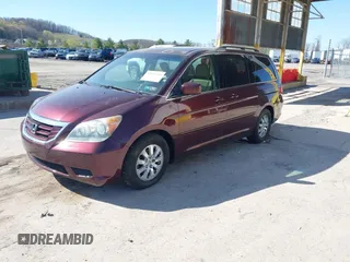 2009 Honda Odyssey EX-L with VIN 5FNRL38619B040594, listed as a IAAI auction lot 42037189 with 189,677 mi miles. Bid and sale history available at carsss.com. Image 2.
