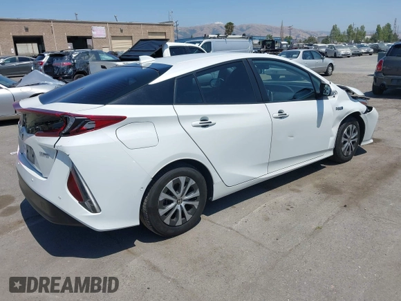 2021 Toyota Prius LE z VIN JTDKAMFP3M3187644, wystawiony jako IAAI lot #42443171 z przebiegiem 126 977 mil mil oraz . Historia ofert i sprzedaży dostępna na DreamBid. Obrazek 4.