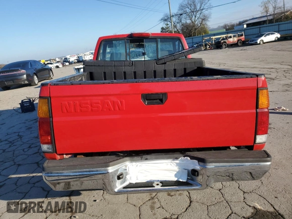 1994 Nissan Frontier with VIN 1N6SD11SXRC360680, listed as a Copart auction lot 84196824 with 105,338 mi miles and Salvage title. Bid and sale history available at DreamBid. Image 6.