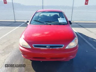 2002 Kia Rio with VIN KNADC123526160314, listed as a IAAI auction lot 41527989 with 124,252 mi miles. Bid and sale history available at carsss.com. Image 13.