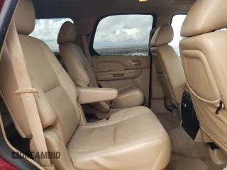 2011 Cadillac Escalade Premium z VIN 1GYS4CEFXBR191558, wystawiony jako Copart lot #42773755 z przebiegiem 107 057 mil mil oraz Szkody całkowita. Historia ofert i sprzedaży dostępna na DreamBid. Obrazek 11.