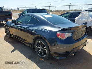 2014 Subaru BRZ Limited with VIN JF1ZCAC16E9601656, listed as a IAAI auction lot 41237518 with 75,490 mi miles. Bid and sale history available at carsss.com. Image 3.