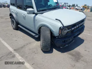 2022 Ford Bronco with VIN 1FMEE5DP6NLB34962, listed as a IAAI auction lot 42432037 with 101,044 mi miles and . Bid and sale history available at DreamBid. Image 1.