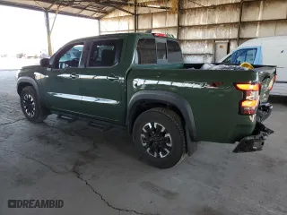 2022 Nissan Frontier PRO-X with VIN 1N6ED1EJ8NN668704, listed as a Copart auction lot 74033864 with 56,198 mi miles and Salvage Title. Bid and sale history available at carsss.com. Image 2.