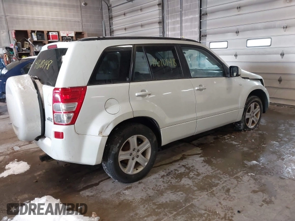 2006 Suzuki Grand Vitara Luxury with VIN JS3TD947764101438, listed as a IAAI auction lot 41610148 with 172,483 mi miles and . Bid and sale history available at DreamBid. Image 4.