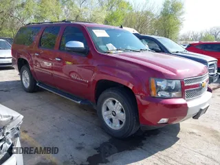 2007 Chevrolet Suburban LTZ with VIN 3GNFK163X7G259264, listed as a IAAI auction lot 42019421 with 130,744 mi miles. Bid and sale history available at carsss.com. Image 1.