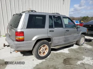 1998 Jeep Grand Cherokee Laredo with VIN 1J4FX58S1WC130492, listed as a Copart auction lot 47656265 with 0 mi miles and Salvage Title. Bid and sale history available at carsss.com. Image 3.