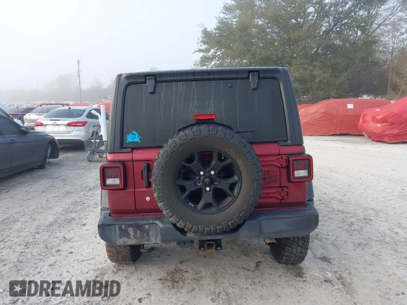 2021 Jeep Wrangler Unlimited Willys with VIN 1C4HJXDN6MW815448, listed as a IAAI auction lot 41459304 with 52,474 mi miles and . Bid and sale history available at DreamBid. Image 16.