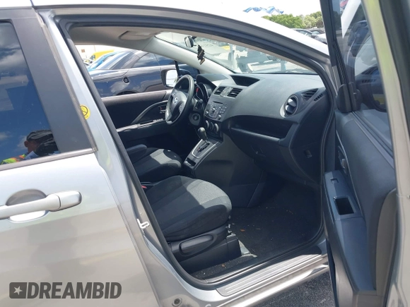 2012 Mazda 5 Sport with VIN JM1CW2BL8C0129591, listed as a IAAI auction lot 42513037 with 177,206 mi miles and . Bid and sale history available at DreamBid. Image 5.