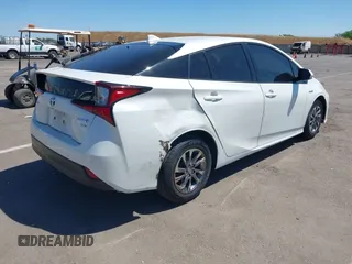 2019 Toyota Prius L Eco z VIN JTDKARFU5K3089070, wystawiony jako IAAI lot #42302536 z przebiegiem 122 911 mil mil oraz . Historia ofert i sprzedaży dostępna na DreamBid. Obrazek 4.