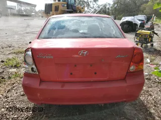 2005 Hyundai Accent GLS with VIN KMHCG45CX5U618473, listed as a Copart auction lot 76752994 with 0 mi miles and Salvage Title. Bid and sale history available at carsss.com. Image 6.