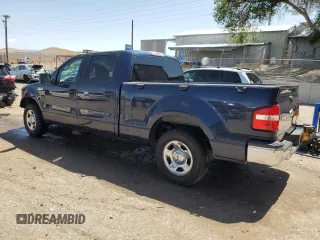 2006 Ford F-150 XLT with VIN 1FTRW02W56KC82964, listed as a Copart auction lot 60256395 with 154,526 mi miles and Salvage title. Bid and sale history available at DreamBid. Image 2.
