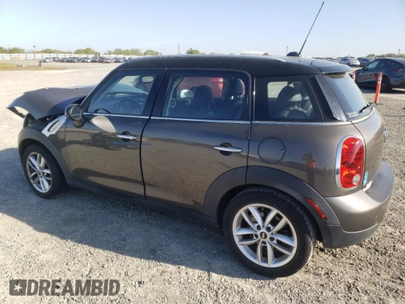 2012 MINI Countryman with VIN WMWZB3C58CWM03815, listed as a Copart auction lot 50097405 with 84,137 mi miles and Salvage Title. Bid and sale history available at DreamBid. Image 2.